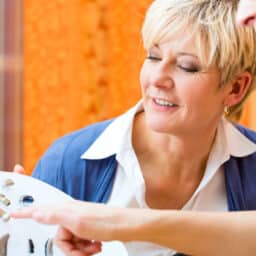 Woman chooses a hearing aid