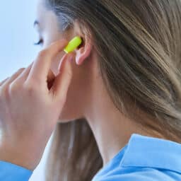 Woman wears hearing protection