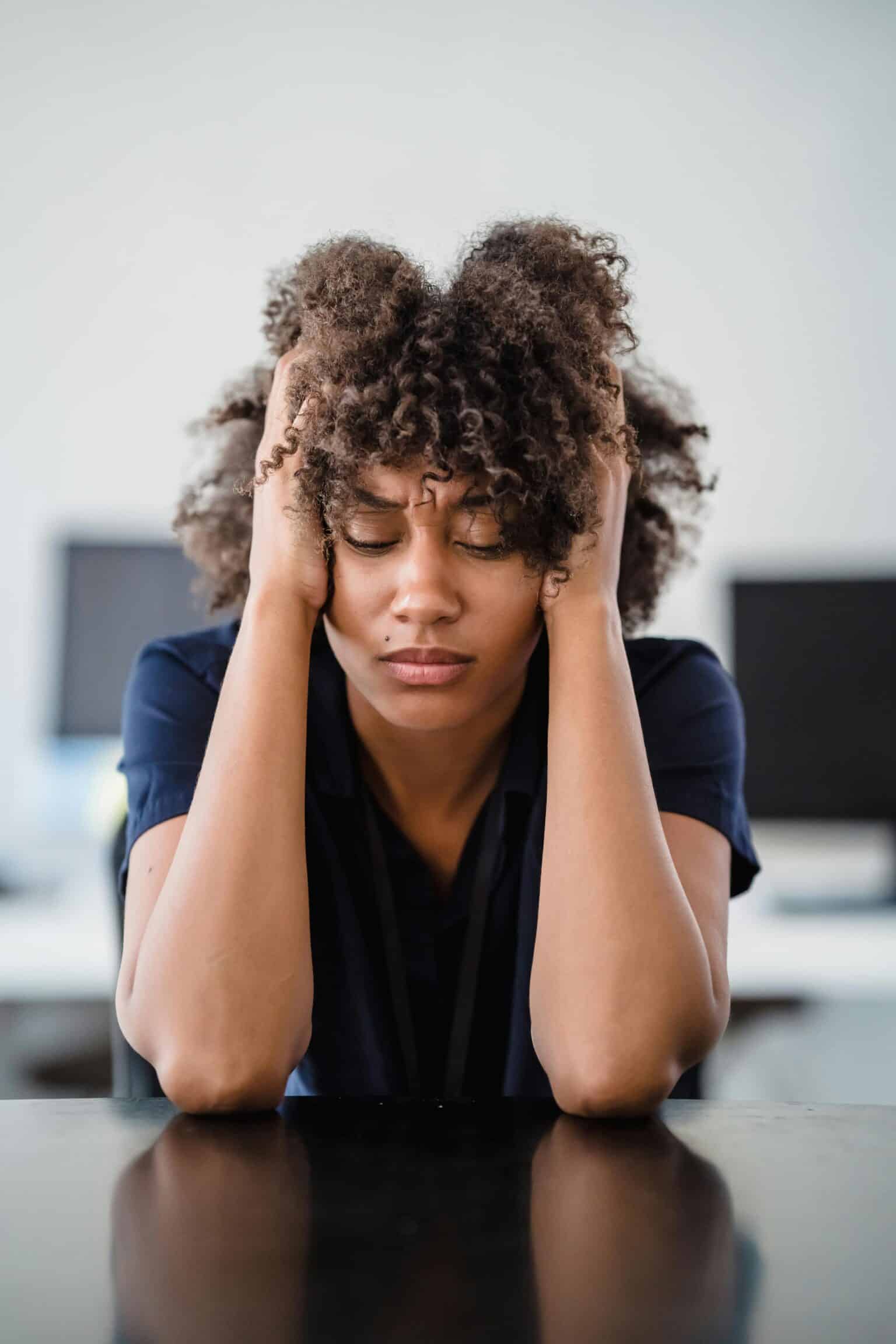 Woman with hearing loss experiencing listening fatigue